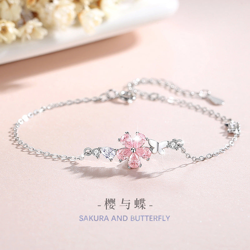 Bracciale in argento sterling 925 – fiore di ciliegio e farfalla e zirconi rosa