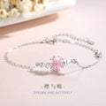 Bracciale in argento sterling 925 – fiore di ciliegio e farfalla e zirconi rosa