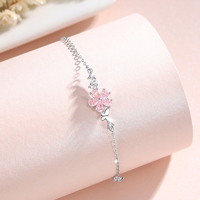Bracciale in argento sterling 925 – fiore di ciliegio e farfalla e zirconi rosa