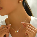 Tiny Sculptural Drop Jewelry