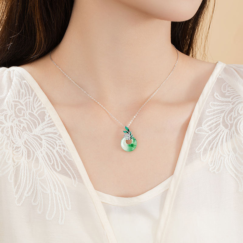 Collana in argento sterling 925 – fenice e disco