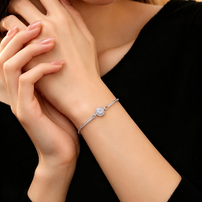 Bracciale in argento fino 999 – borsetta e zirconi