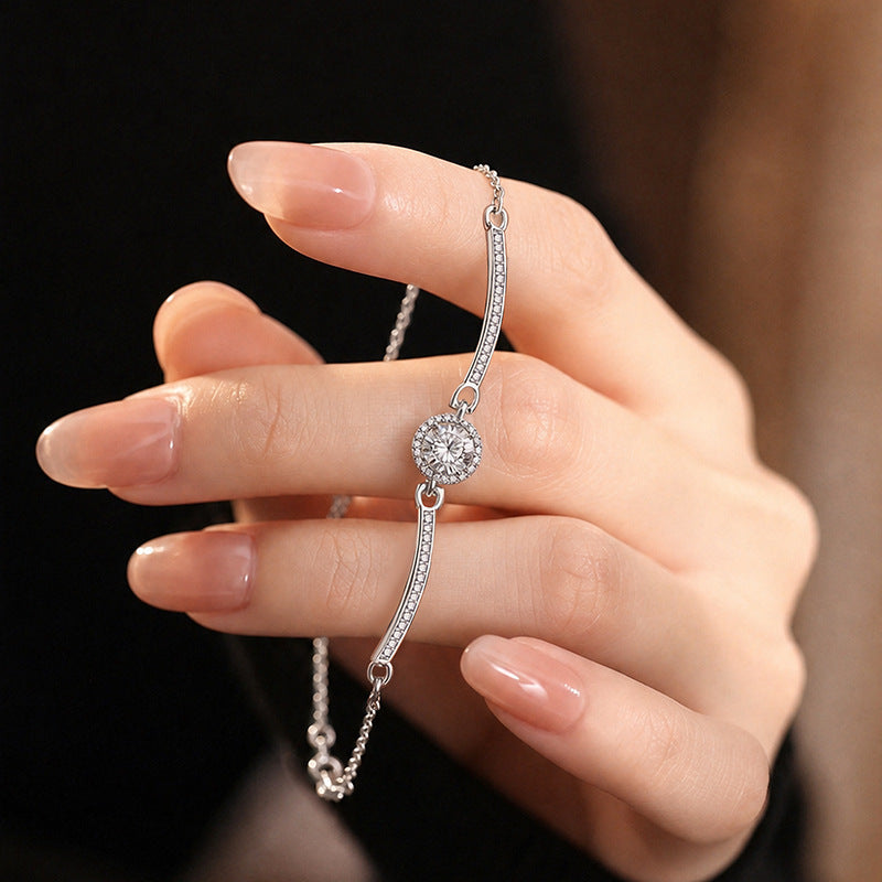 Bracciale in argento fino 999 – borsetta e zirconi