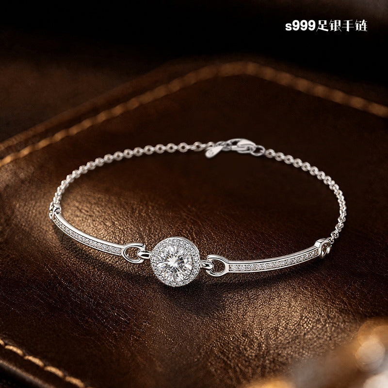 Bracciale in argento fino 999 – borsetta e zirconi