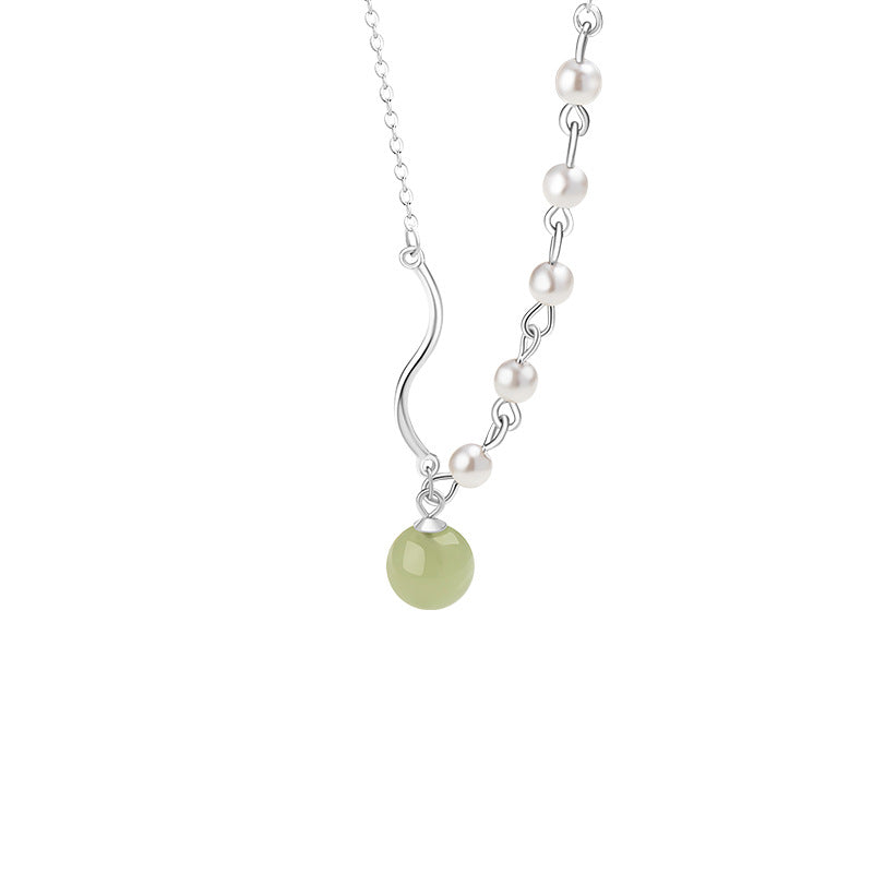 Collana in argento fino 999 e dettaglio perlato