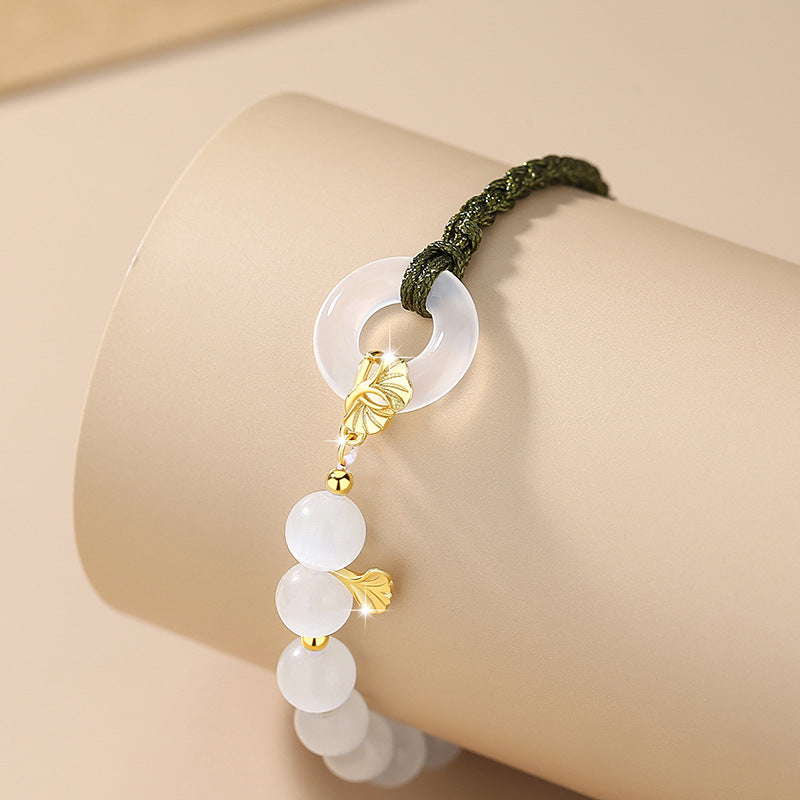 Bracciale in argento sterling 925 – disco e foglia e calcedonio