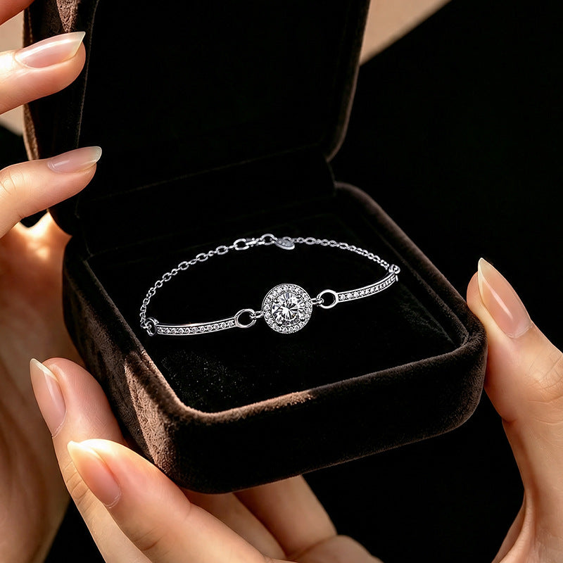 Bracciale in argento fino 999 – borsetta e zirconi