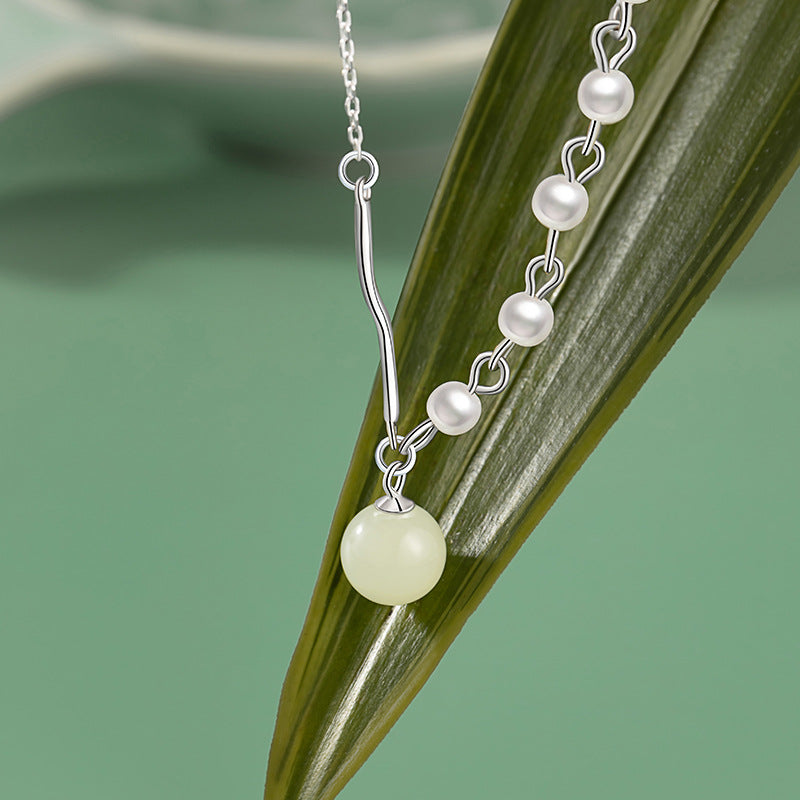 Collana in argento fino 999 e dettaglio perlato