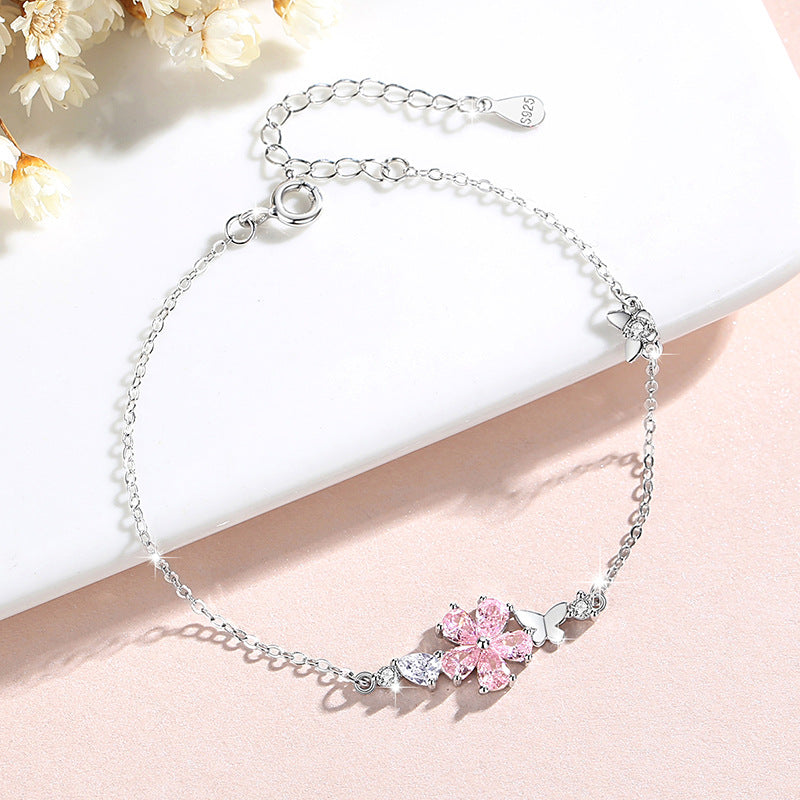 Bracciale in argento sterling 925 – fiore di ciliegio e farfalla e zirconi rosa