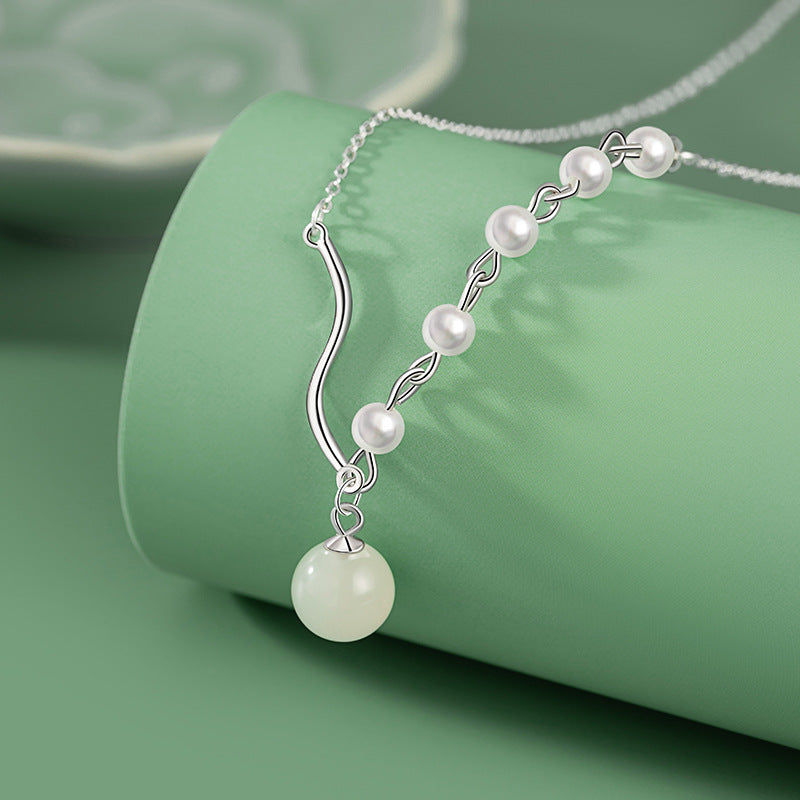 Collana in argento fino 999 e dettaglio perlato