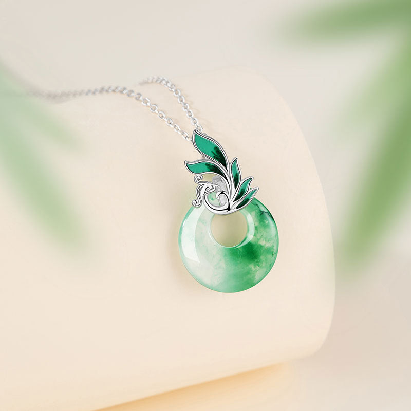 Collana in argento sterling 925 – fenice e disco